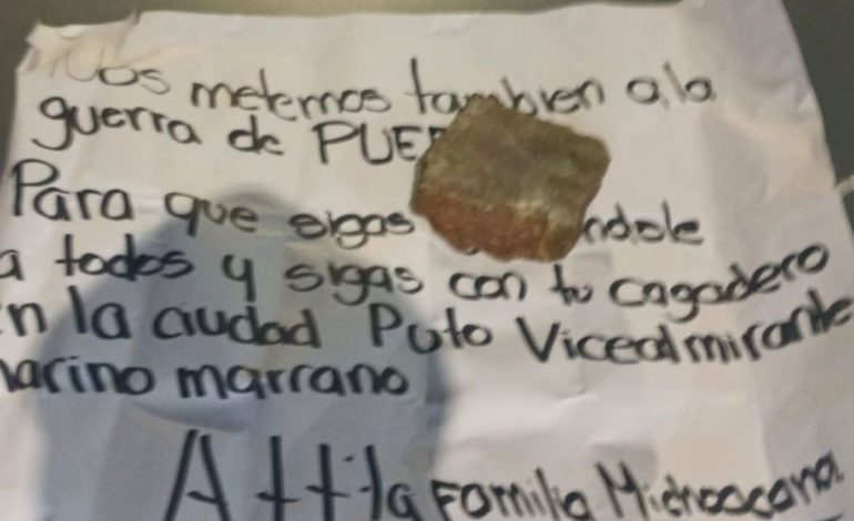 Narcomanta y vehículo incendiado en periférico de Puebla vinculan a La Familia Michoacana con violencia local