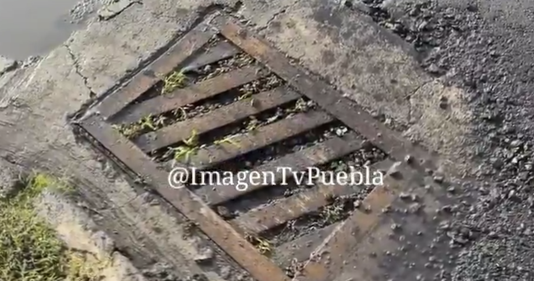 Vecinos de Puebla denuncian coladeras tapadas tras rehabilitación de calle 7 Sur