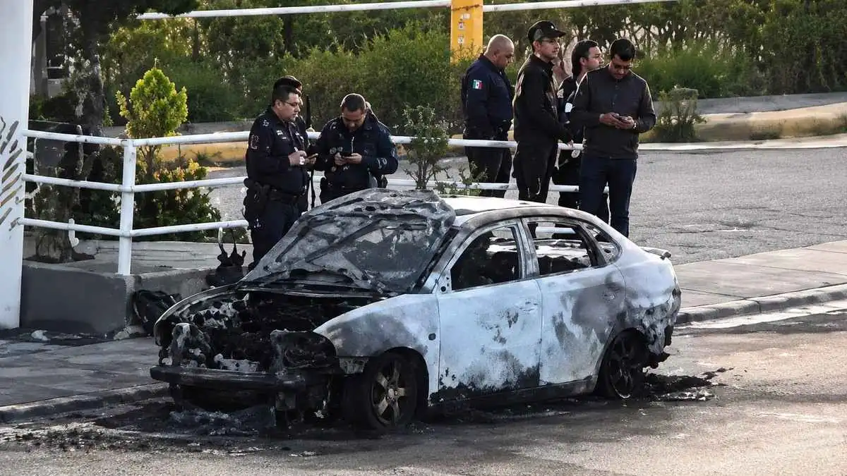 Capturan a presuntos integrantes de La Familia Michoacana en Puebla; uno vinculado a auto calcinado en Periférico Ecológico